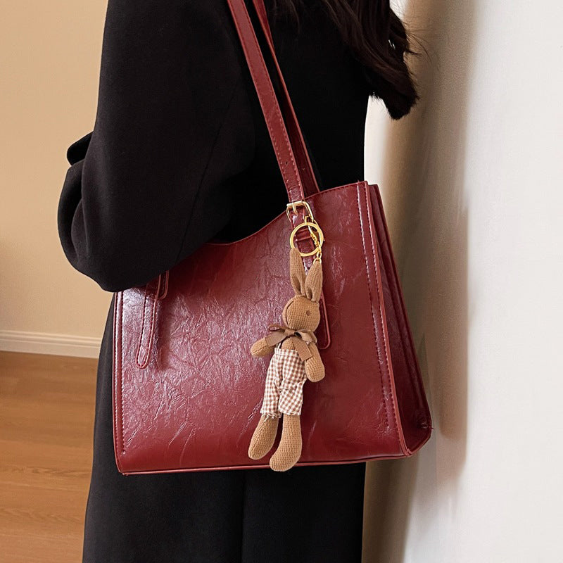 Women's Trendy Shoulder Bag with Doll Pendant